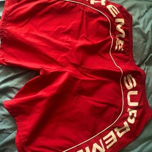 Red supreme shorts